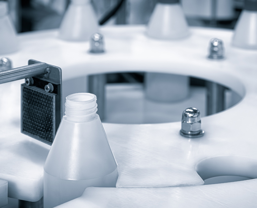 Bottles of detergent being packaged Bottles of detergent being packaged